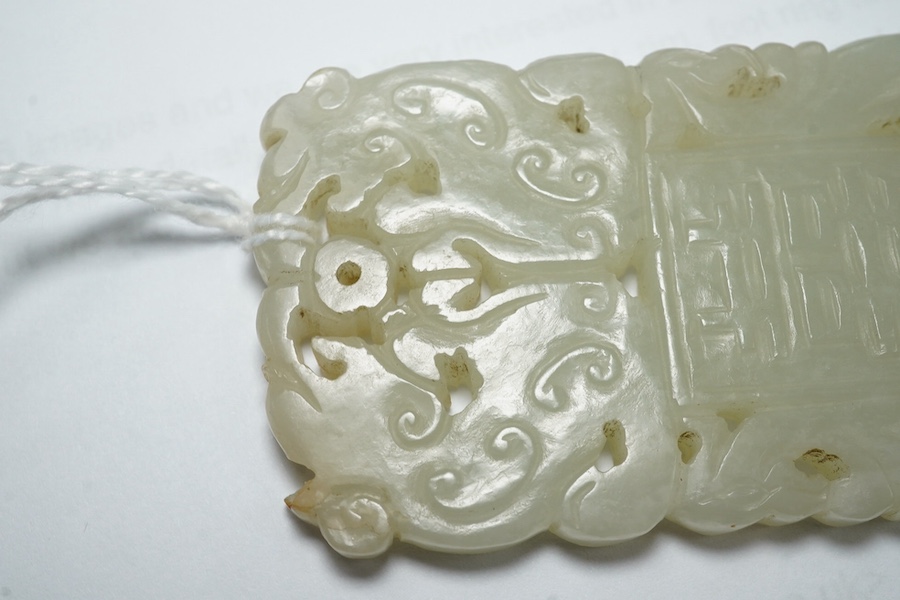 A Chinese white jade ‘Shuangxi’ plaque, 19th/20th century